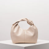 Stylish twist square bag, solid color top clutch bag, simple and versatile commut