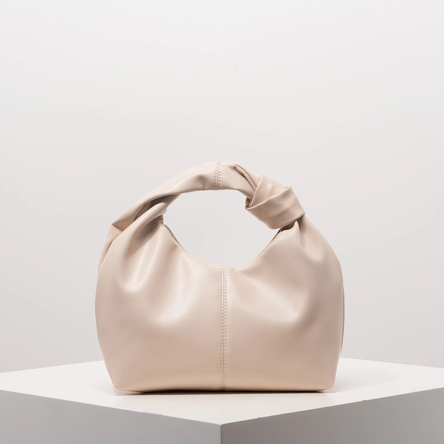 Stylish twist square bag, solid color top clutch bag, simple and versatile commut